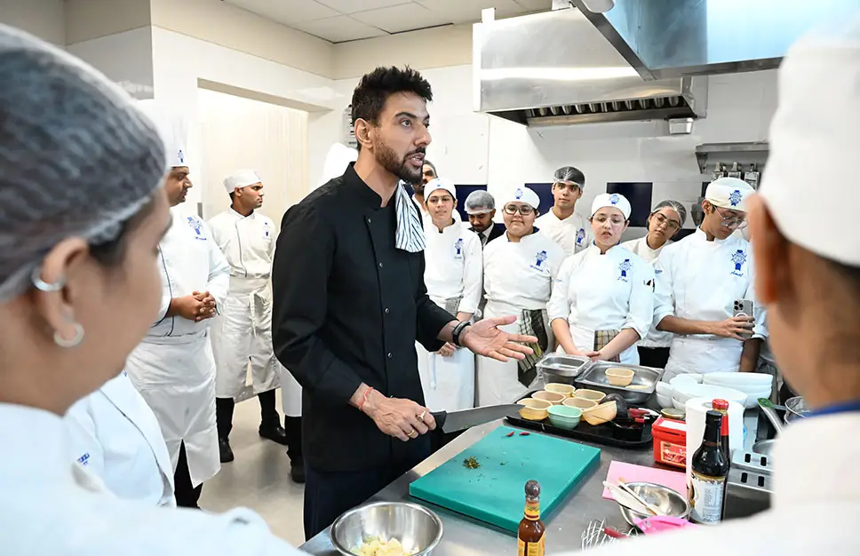 Dr. Ranveer Brar cooks in Brar’s Kitchen at Le Cordon Bleu